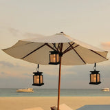 Waterproof LED Solar Outdoor Garden Lamp with lanterns on a beach umbrella