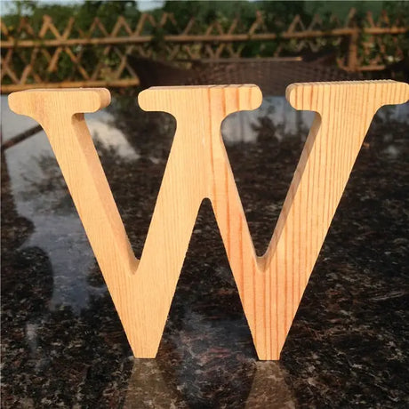 Natural pine wooden letter W, ideal for photo frames and as a perfect gift