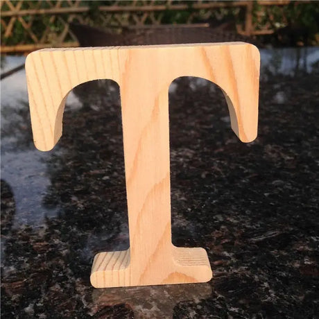 Wooden letter T in serif font for photo frames and home decor, perfect gift idea