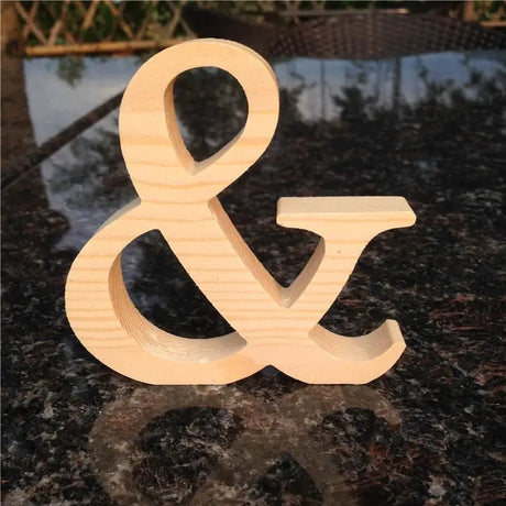 Wooden ampersand symbol for home decorations and perfect gift ideas in unfinished wood letters