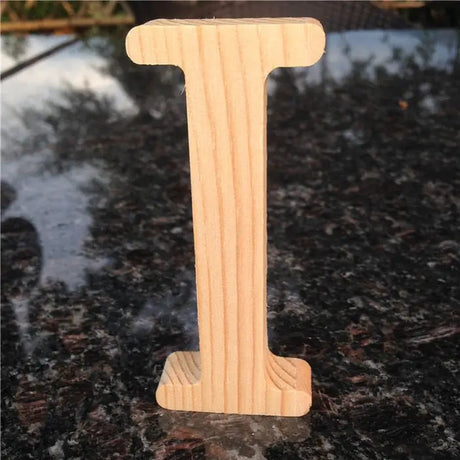 Wooden letter I showcasing wood grain, ideal for photo frames or unfinished wood letters