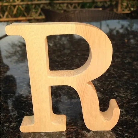 Wooden letter R in light beige, ideal for photo frame or as a perfect gift