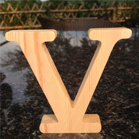 Wooden letter V in natural finish for photo frames or as perfect gift in home decor