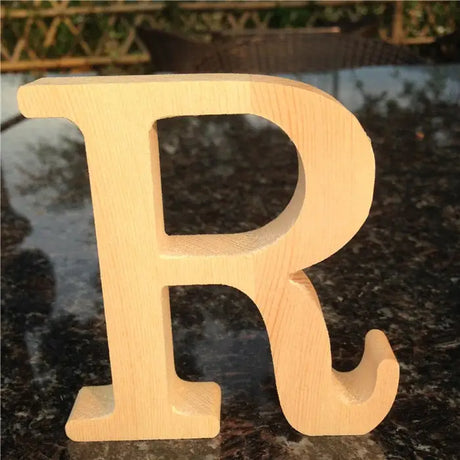 Wooden letter R in natural wood color, part of unfinished wood letters for home decor