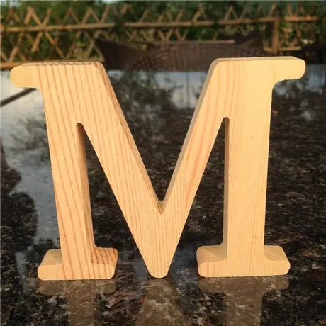 Wooden letter M in serif font, ideal for photo frames or as an unfinished wood letters gift