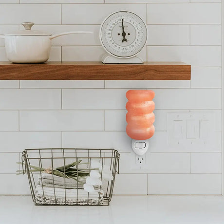 Pink Himalayan salt lamp in a Wooden Headboard Bed with Himalayan salt night light