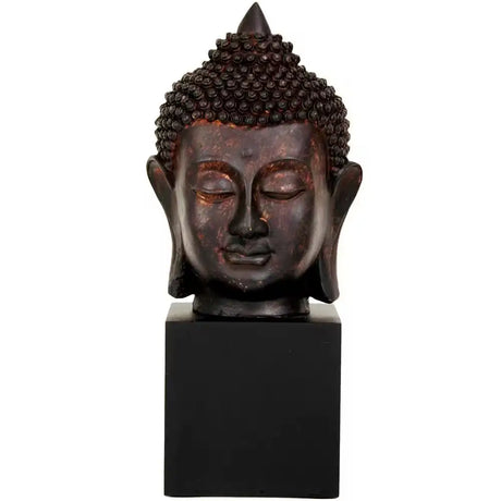 Dark brown Buddha head statue with serene expression on black base for decorative elegance